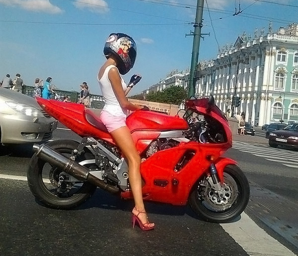 sexy lady on red motorcycle